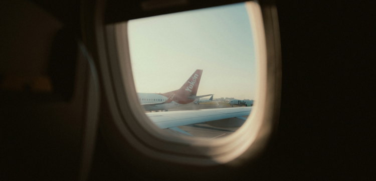 view-from-airplane-window-of-another-plane-on-tarmac.jpg View from airplane window of another plane on tarmac